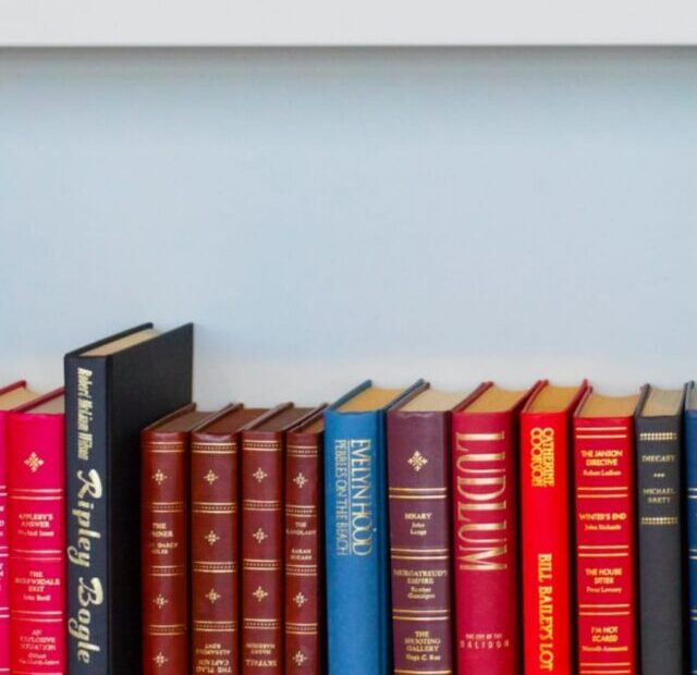 cropped-Books-on-rack.jpeg